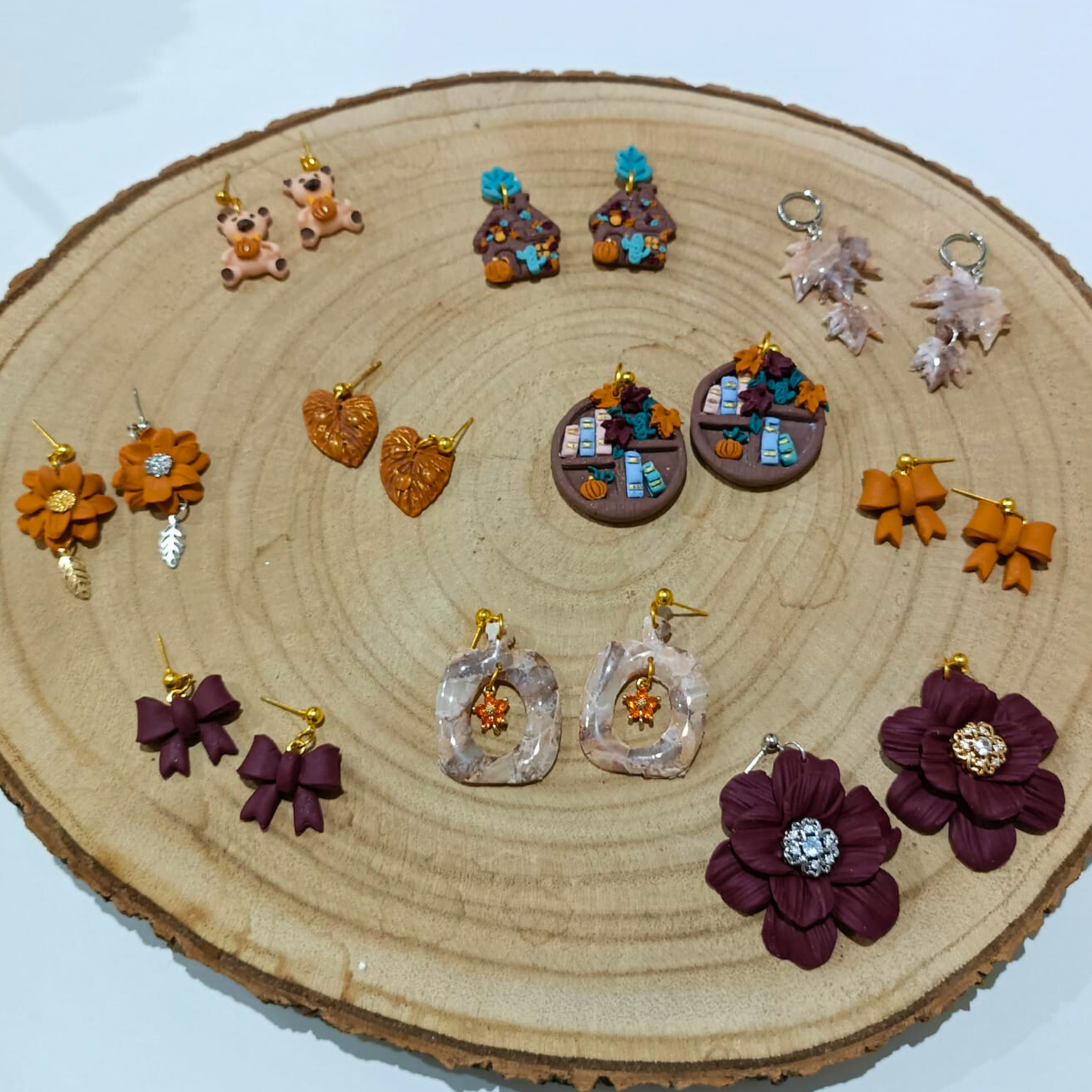 PENDIENTES LAZO BERENJENA